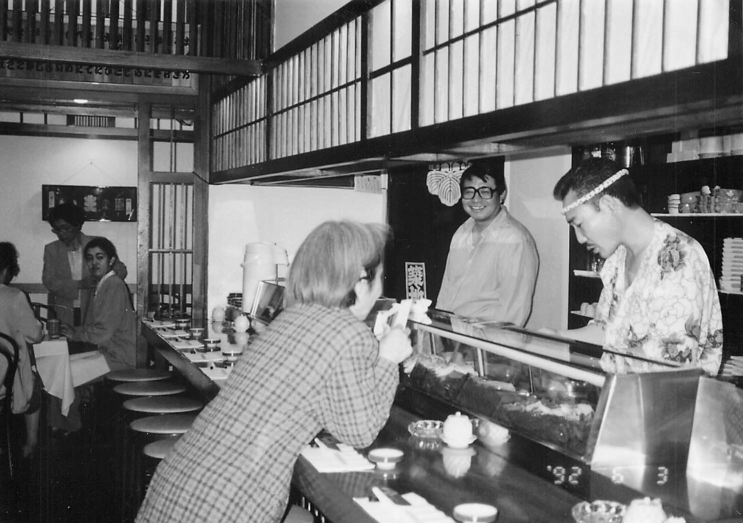 Tsukizi in 1992 — Shinsaku Sukeno behind the counter, from the family archive